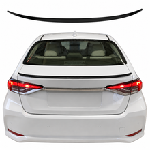 Toyota-Corolla spoiler mounted on top of boot lid